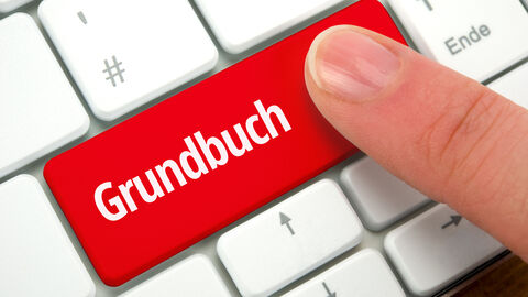 Grundbuch PC-Tastatur mit Beschriftung "Grundbuch"